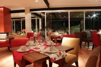 Río Arriba Suites & Apartments & Restó - sarapan