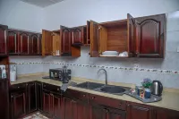 Cute and Cozy family home for short and long stays Hotels in Ga West