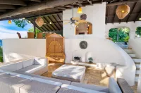 Amazing sunset, ocean front, open air villa w/path to sea and dock