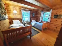 Escape to Howie's Camp: Unwind and Recharge at This Lakefront Log Cabin