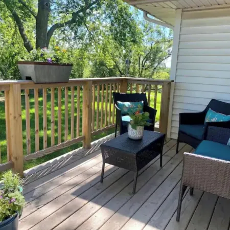 Cheerful two bedroom home in quiet neighborhood. Sun Porch ~ Patio ~  Large yard
