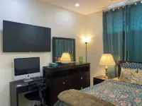 Charming Oasis Tranquil Suite 8 min Airport, AC
