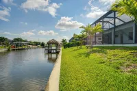 Pool & Outdoor Kitchen: Waterfront Cape Coral Home - parking
