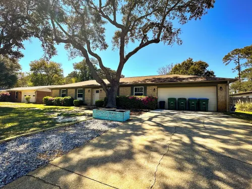 Private 4-bed/3 bath house with putt-putt golf, heated pool, and hot tub.