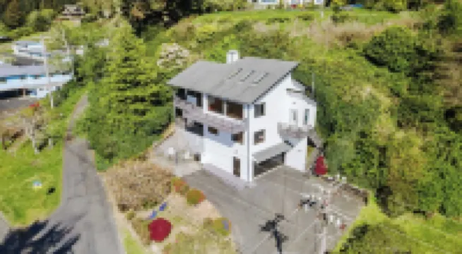 Overlook the Winchester Bay Harbor from the spacious 3rd Level!