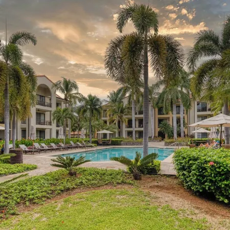 Spacious One-Bedroom Condo with Pool View, Balcony & Beach Club Access