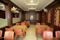 Kalyan Tourist Home Hotels in Pudussery West