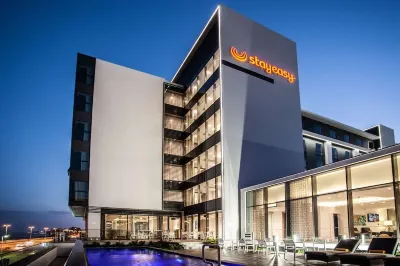 StayEasy Maputo Hotels near New Life Christian Centre