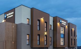 "a modern building with a sign that reads "" best western "" and "" international express "" on it" at Best Western Hotel le Semaphore