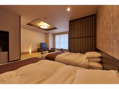 観察風呂付き羊蹄山側デラックス和洋室 湯元ニセコプリンスホテルひらふ亭の写真