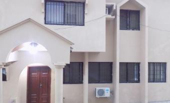 Posh Apartments and Hotel