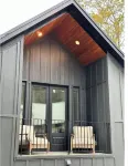 Cottage offering Luxury & Privacy on 80 acres with stocked pond.