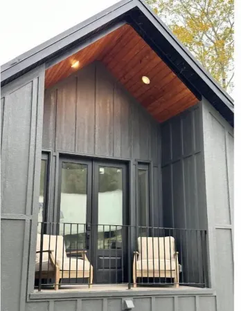 Cottage offering Luxury & Privacy on 80 acres with stocked pond.