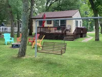 Julia’s Lakefront Cottage…updated cabin, private dock  & beautiful sunsets.