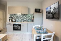 Modern 1-room apartment near the train station, newly renovated, top furnishings