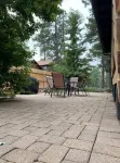 Caribou Cabin Outdoor Deck w Firepit Table & TV