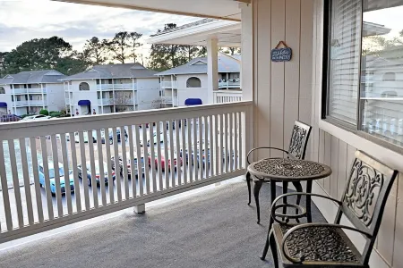 Quiet Condo with King Suite 4 Miles from the Beach,Private Balcony,Pool Hot Tub.