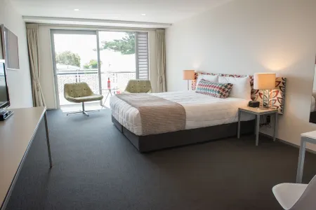 Navigate Seaside Hotel & Apartments Отели рядом с достопримечательностью «Блафф Хилл Домейн»