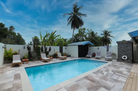 Airport Inn Отели в г. Tunapuna