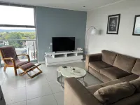 Kmg Apartments at the Apex