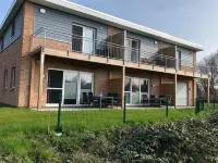 Modern vacation home Deichkieker with its own sauna Hotels in Tossens