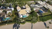 Tropical Golf View Villa. Steps to the ocean with a Gym and Theater-game room.