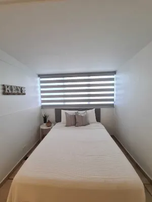 Blue Paradise: Modern Apartment steps away from beach in center of Condado!