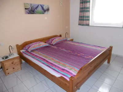 Bungalow with apartment in a quiet location and large pool