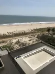 Beautiful Direct Beach Front and Bayside View Condo with POOL!!