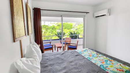 Tales of Pacific : F2 Central et Spacieux, Piscine, Salle de Sport et vue mer Отели в г. Фааа