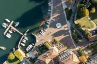 ELEGANT APARTMENT IS LOCATED A FEW STEPS FROM THE LAKEFRONT OF CERNOBBIO.