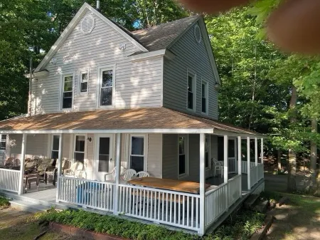 Angola on the Lake Beach House Spacious 4BR  private beach wrap-around porches