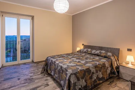 Katia House - Apartment Glicine Отели в г. Кастельнуово-Кальчеа
