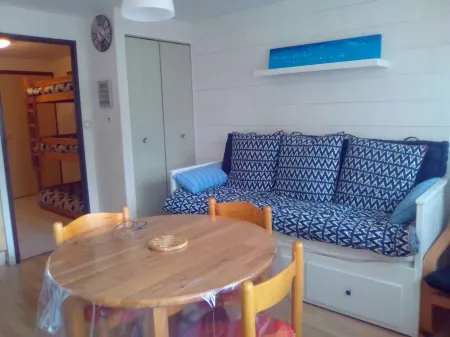 Studio with sleeping area for small family.