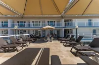 Inviting Balcony and Relaxing Pool - Beautiful Oceanfront Haven