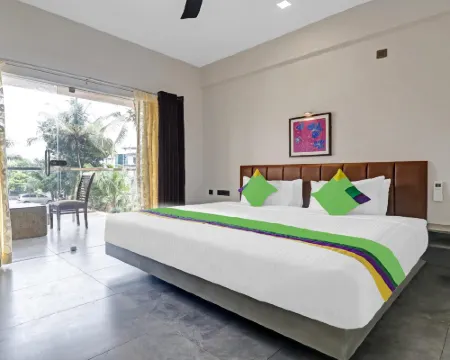 Treebo Grand Vistara Airport Suites Hotels in Ernakulam