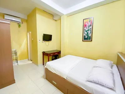 Damigalova Guest House Mitra RedDoorz Hotel dekat Pertamini Simpang Rimbo Jambi