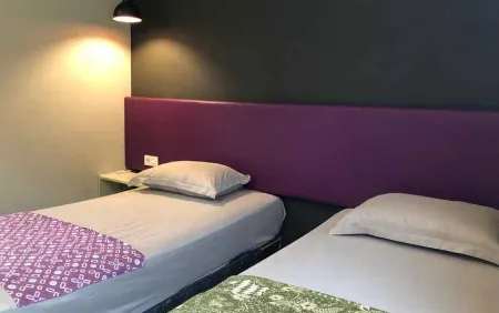 Suja Menteng Guesthouse Отели в г. Паланкарая