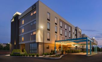 "a large hotel building with a sign that reads "" hyatt place "" prominently displayed on the front of the building" at Home2 Suites by Hilton Downingtown Exton Route 30