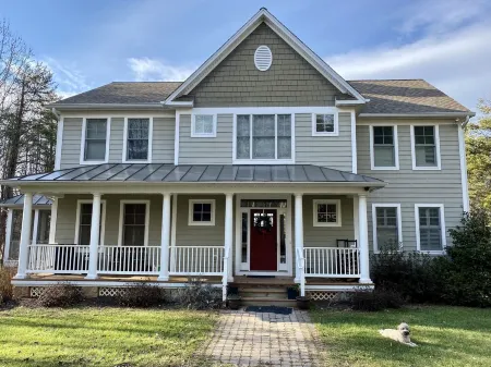 Large Lux Waterfront Home on 9 Acres with Sandy Beach and Beautiful Sunsets