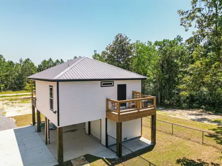 New cottage blocks from the beach; pets OK! Firepit!  Grill! EV Charger! 65” TV