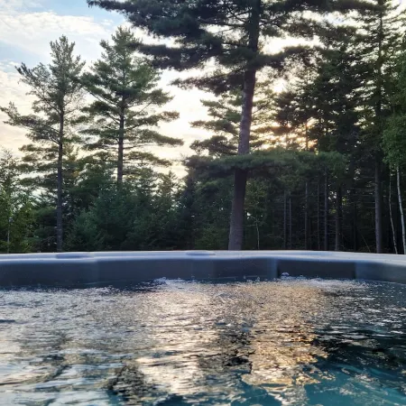 Spacious house with pebble beach. Direct access to Snowmobile and ATV trails!