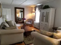 Enjoy comfortable elegance in this secluded grand home located in town