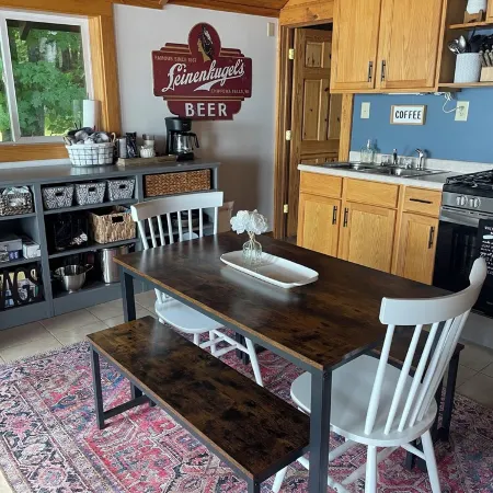 Cozy cabin right on the water! All bikers, skiers, fisherman and more welcome!