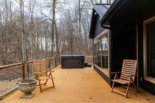 Secluded Cabins on Private Stocked Pond Hot Tub. Ping Pong. Arcade. Master Suite