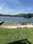 A quiet cove, the sunset and a sandy beach, on Lake Winnipesaukee