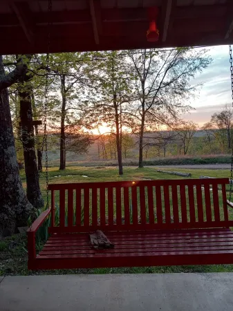 Rustic log cabin in the woods with great sunset views