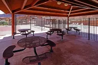 The Howling Coyote - Moab's Adventure Basecamp