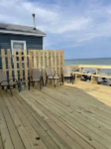 Three bedrooms with kitchen and a huge deck.