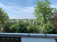 Apartment with a view of the dyke for up to 4 people. -Turquoise